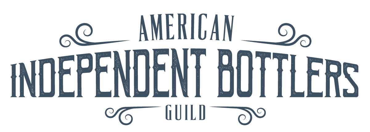 the American Independent Bottlers Guild logo. The word AMERICAN sits on top, with INDEPENDENT BOTTLERS in the center of the logo with an arched top, and the word GUILD below - to the left and right of AMERICAN and GUILD are two flourishes